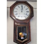 Early 20th Century simulated rosewood octagonal drop dial wall clock, the painted dial with Roman