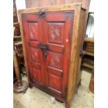 Swat (Afghanistan) carved and painted pine two door cupboard, the doors each inset with three