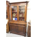 Victorian mahogany secretaire bookcase, the moulded cornice above a pair of glazed doors enclosing