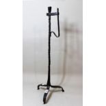 Antique wrought iron candle holder/ rush light stand, 68cms high