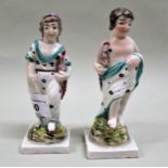 Pair of late 18th / early 19th Century Pratt type figures of boy and girl each carrying an exotic
