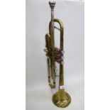 20th Century brass trumpet with mouthpiece, engraved B&M Champion