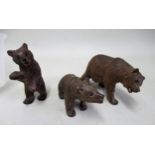 Three small Black Forest carved figures of bears