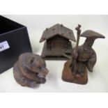 Small Black Forest carved figure of a bear, similar model of a chalet and a small oriental carved