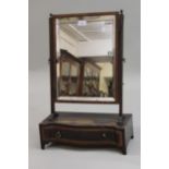 19th Century mahogany and inlaid rectangular swing frame toilet mirror with a serpentine shaped