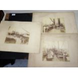 Album containing three large format photographs, scenes onboard a ship, cable laying and buoy