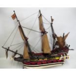 Painted wooden model of a 16th Century four masted galleon, 68cms long overall
