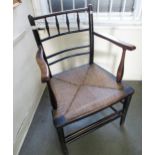19th Century ebonised ash and beech Sussex chair with a rail and spindle back, above the original