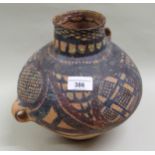 Chinese pigment painted pottery two handled jar, possibly Neolithic, 23cms high (various surface