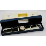 Raymond Weil gentleman's circular gold plated wristwatch, with leather strap in original box