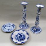 Pair of 19th Century Delft ware blue and white candlesticks, 35cms high together with two Delft blue