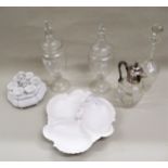 Pair of glass ovoid bonbon jars with covers, 36cms high together with a porcelain egg cup set,