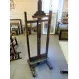 Early 20th Century artist's beechwood adjustable easel, stamped Young, Gower Street, London, 55.5cms