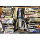 Two boxes containing thirty eight unbuilt model aircraft kits including Airfix, Revel etc.