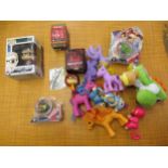 Box containing a quantity of toys including Funko Felicity Smoak, Bakugan, Yoshi etc.