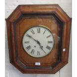 Early 20th Century Continental oak wall clock of irregular octagonal design, the painted 9in dial