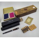 Parquetry inlaid crib box, quantity of playing cards and a Cerruti fountain pen