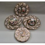 Group of four 20th Century Capo di Monte wall plaques, the largest 34.5cms diameter