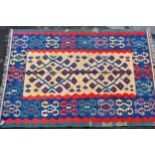 Turkish Kelim rug with a beige ground centre floral panel and blue ground border with hooked motifs,