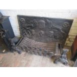 Large antique cast iron fireback, with a pair of large dogs and wrought iron grate, 110cms wide x