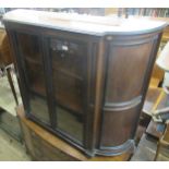 Victorian mahogany semi bow fronted side cabinet with a pair of glazed doors, flanked by bow panels,