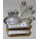 Three piece silver backed dressing table set, silver mounted glass perfume decanter, pair of