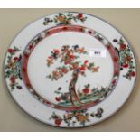 18th Century Chinese circular wall plate painted with a flowering tree, 28cms diameter (at fault)