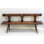 19th Century Tyrolean pine bench seat, the splat back above a chip carved plank seat and rustic