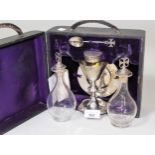 Edwardian silver and glass travelling communion set by Charles Farris, London, comprising: two