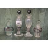 Group of four frosted glass perfume bottles with silver mounts All in good condition. No chips or