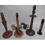 1920's Barley twist table lamp base, two Cotswold type oak lamp bases and a barley twist candlestick