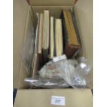 Box containing a collection of world and commonwealth stamps in albums, packets, loose leaves and