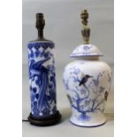 Pair of modern pottery table lamps decorated with birds and with gilt brass finials, together with a