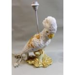 Pair of mid 20th Century Continental pottery table lamps, each in the form of a cockatoo, 39cms high