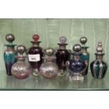 Group of eight various coloured glass silver mounted perfume bottles All in good condition. No chips