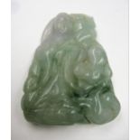 Small 20th Century carved pale green jade pendant in the form of two figures, 7cm high