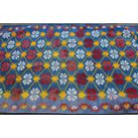 Kelim rug of all-over floral design, on blue ground, 190cms x 104cms