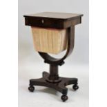 19th Century rosewood work table with hinged cover, fitted interior and silkwork wool basket, on a