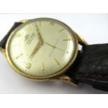 Gentleman's 9ct yellow gold cased Movado automatic wristwatch with subsidiary seconds and later