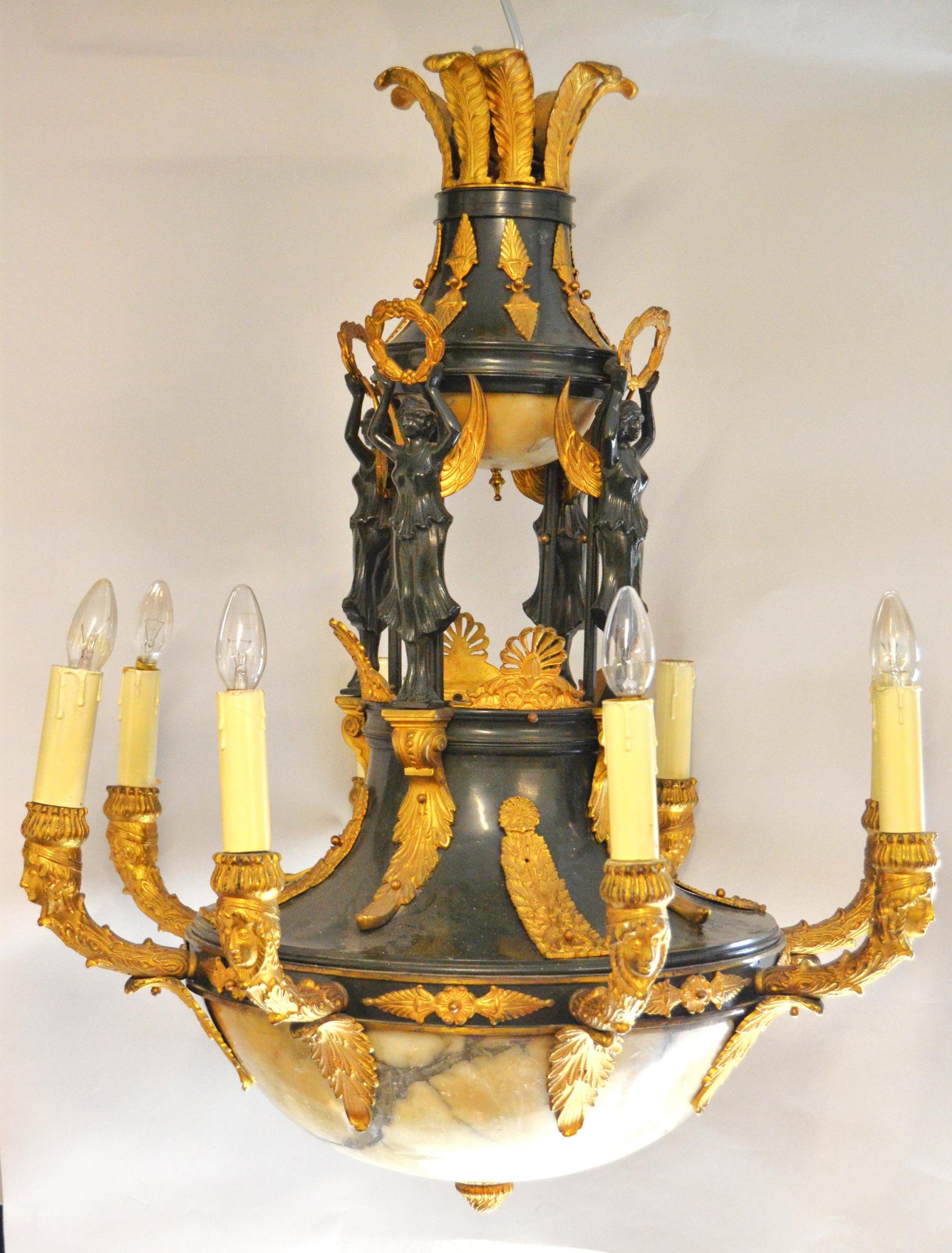 Fine Regency dark patinated and gilt bronze light fitting, the main body with an ostrich feather