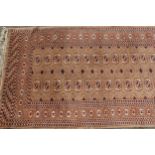 Pakistan Turkoman design runner with two lines of gols and multiple borders on a beige ground,