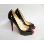 Christian Louboutin, Paris, black patent leather peep toe court shoes, size 39 In good condition.