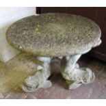 Circular cast concrete garden table on three dolphin supports, 68cm diameter