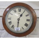 Small circular mahogany wall clock, the 8in enamel dial with Roman numerals, with a single train