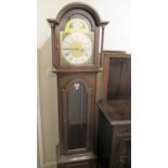 Reproduction mahogany longcase clock, the brass and silvered dial with pendulum window, 188cms high