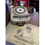 Mid 20th Century Dansette record player in original case, together with one volume, ' Our Neighbours