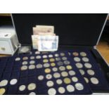 Collection of World coinage and banknotes, housed in an aluminium attaché case