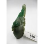 Small 20th Century two colour green jade carving in the form of a two handled vase, 9cm high overall