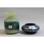 Okra iridescent glass bowl, 13cms diameter x 6cms high, together with an Mdina art glass bottle