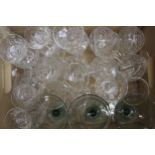 Set of twelve hollow stem glass Champagne cups, together with a set of eight cut glass Champagne